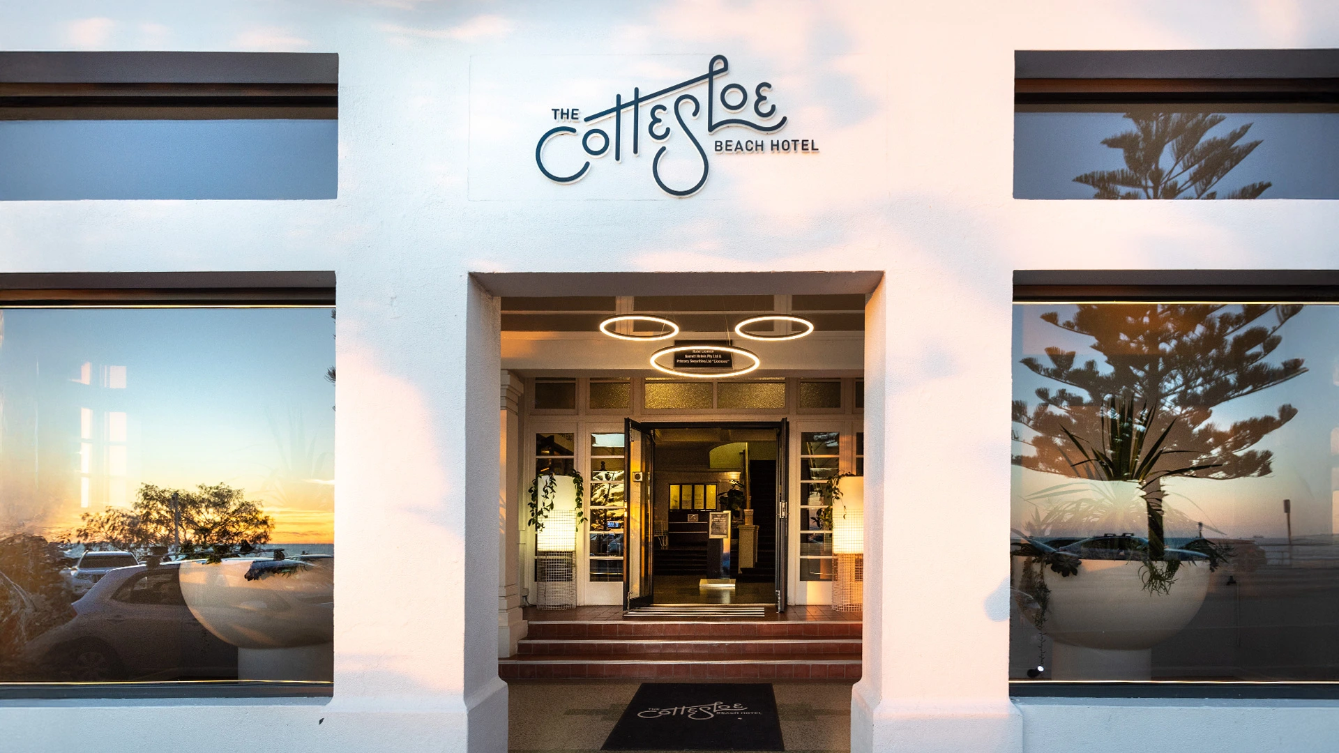 Cottesloe Beach Hotel banner showing exterior and interior photography alongside the circular Cottesloe logo badge in warm golden tones