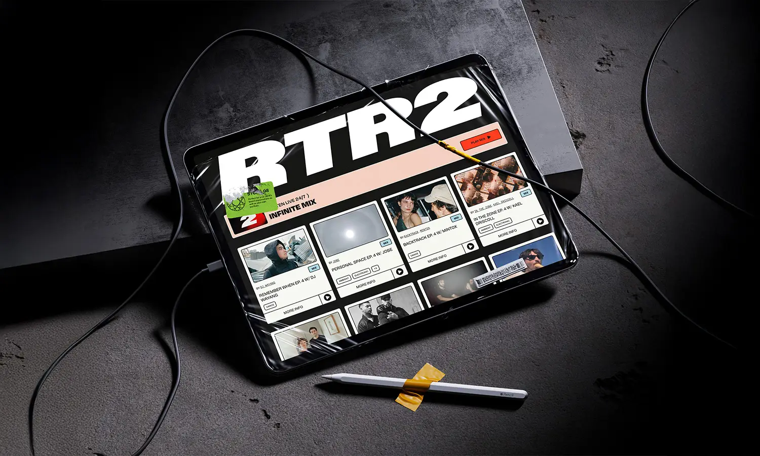RTR2 RTRFM branding displayed on dark device mockups showing the sub-brand identity on tablets or screens